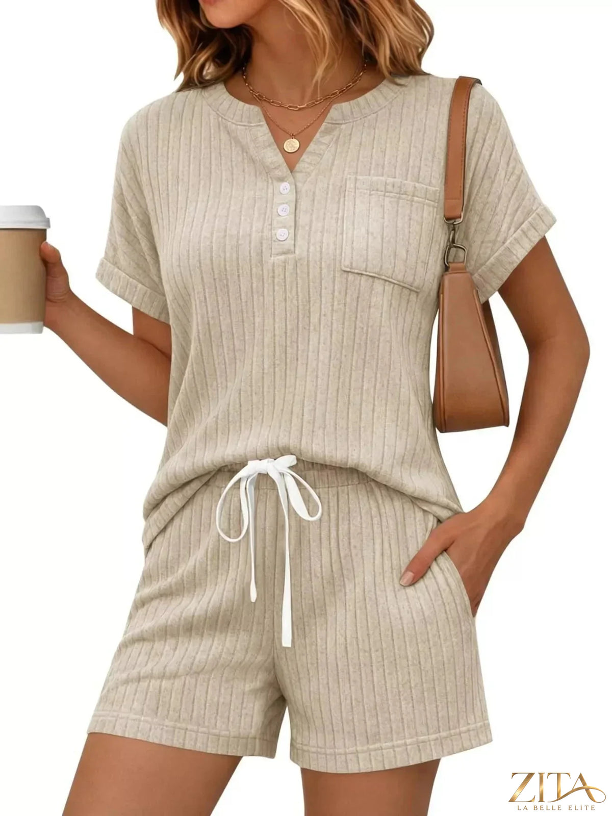 Casual ribbed knit tee and shorts set from Trendsi, featuring a comfortable, stylish matching top and bottom in soft fabric.