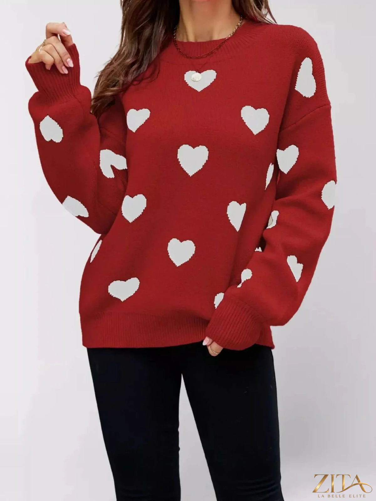 Heart-patterned dropped shoulder sweater by Zita La Belle Elite, featuring a cozy knit with romantic heart designs on a soft fabric.