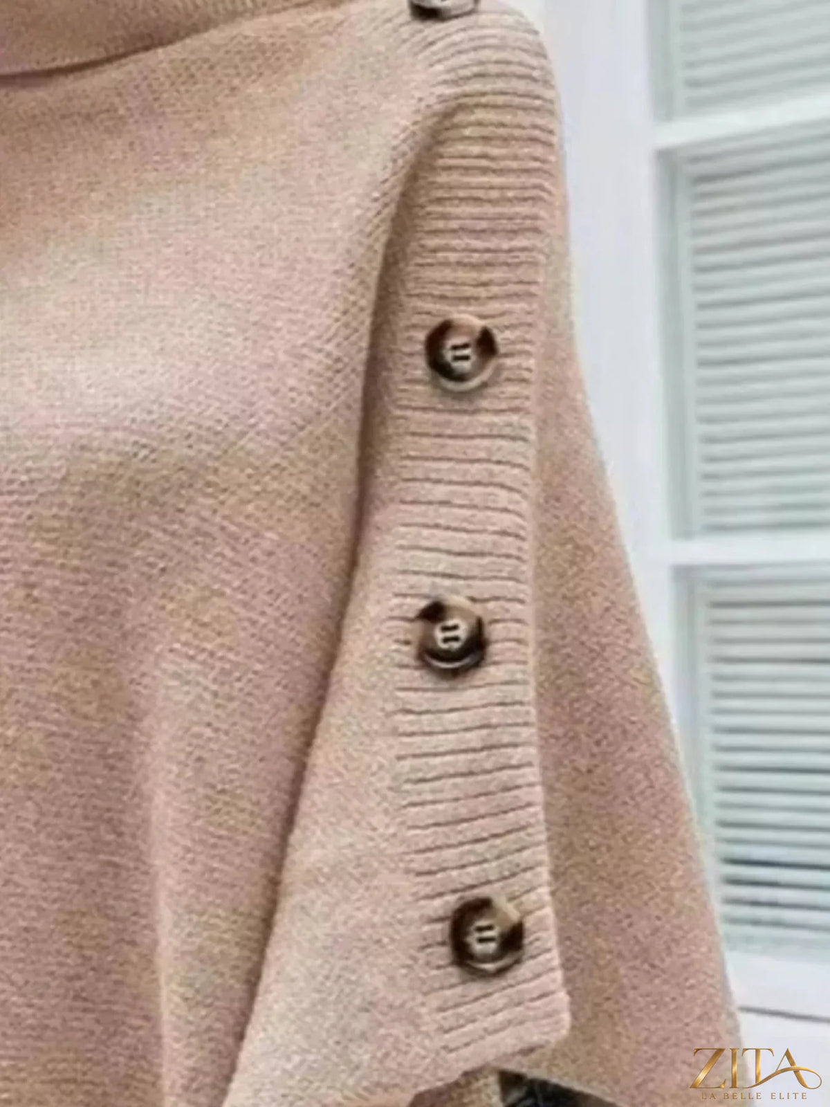 Zita La Belle Elite button-decor turtleneck poncho pullover in cozy knit fabric, featuring a stylish turtleneck and button details.