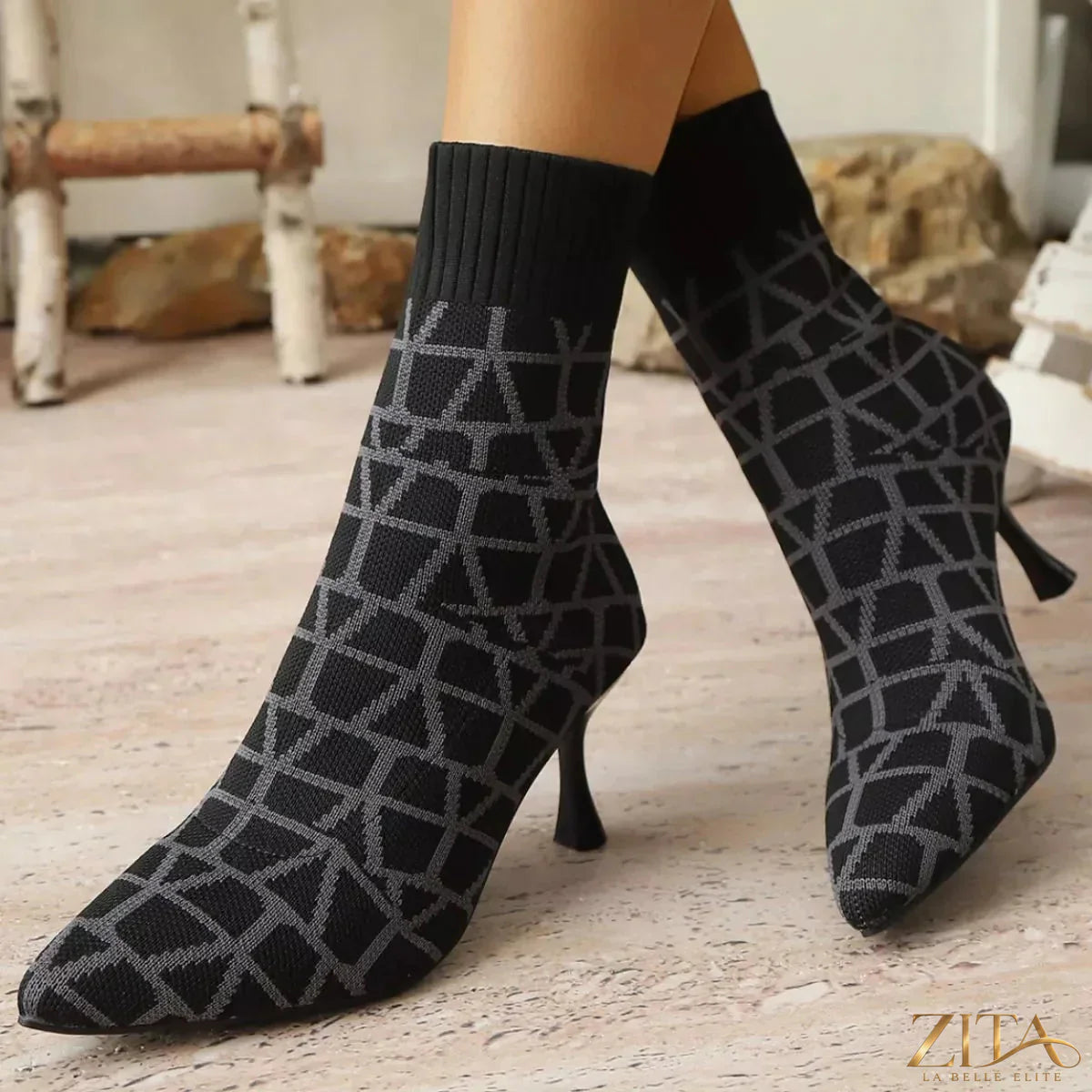Zita La Belle Elite point toe flared heel boots in black leather with sleek silhouette and stylish design.