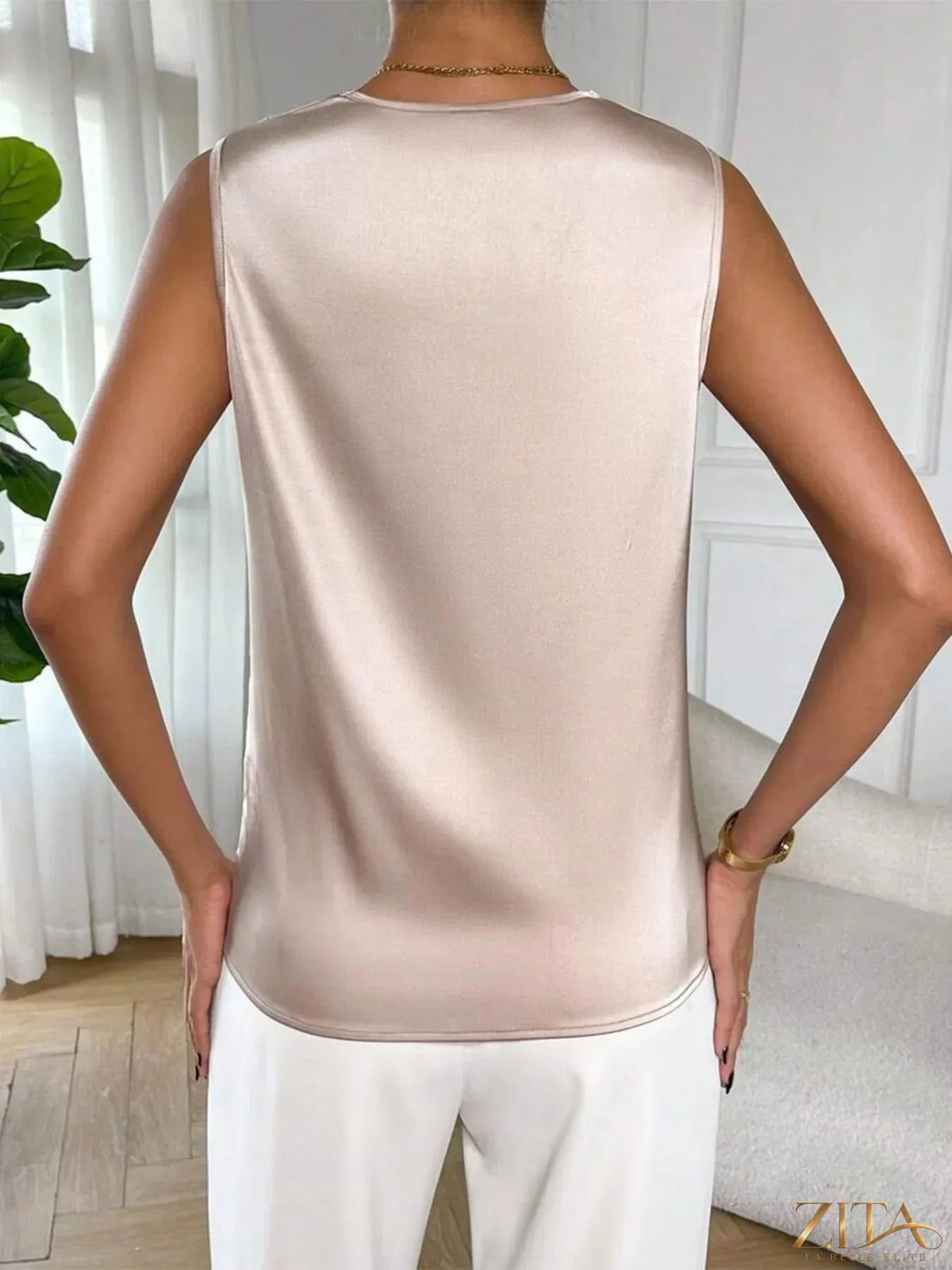 Satin cowl neck sleeveless blouse by Zita La Belle Elite, featuring a smooth satin fabric and elegant draped neckline.
