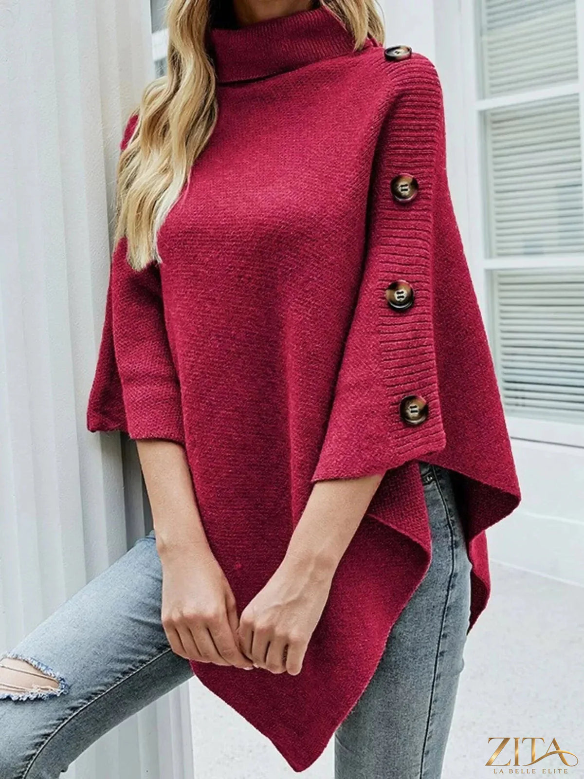 Zita La Belle Elite button-decor turtleneck poncho pullover in cozy knit fabric, featuring button details and relaxed fit.