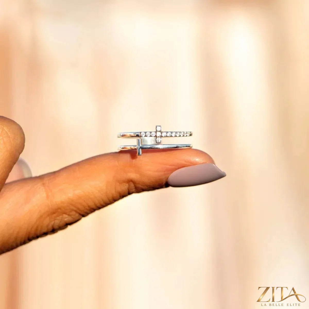 Silver double band cross ring by Zita La Belle Elite featuring two sleek intersecting bands and a detailed cross design.