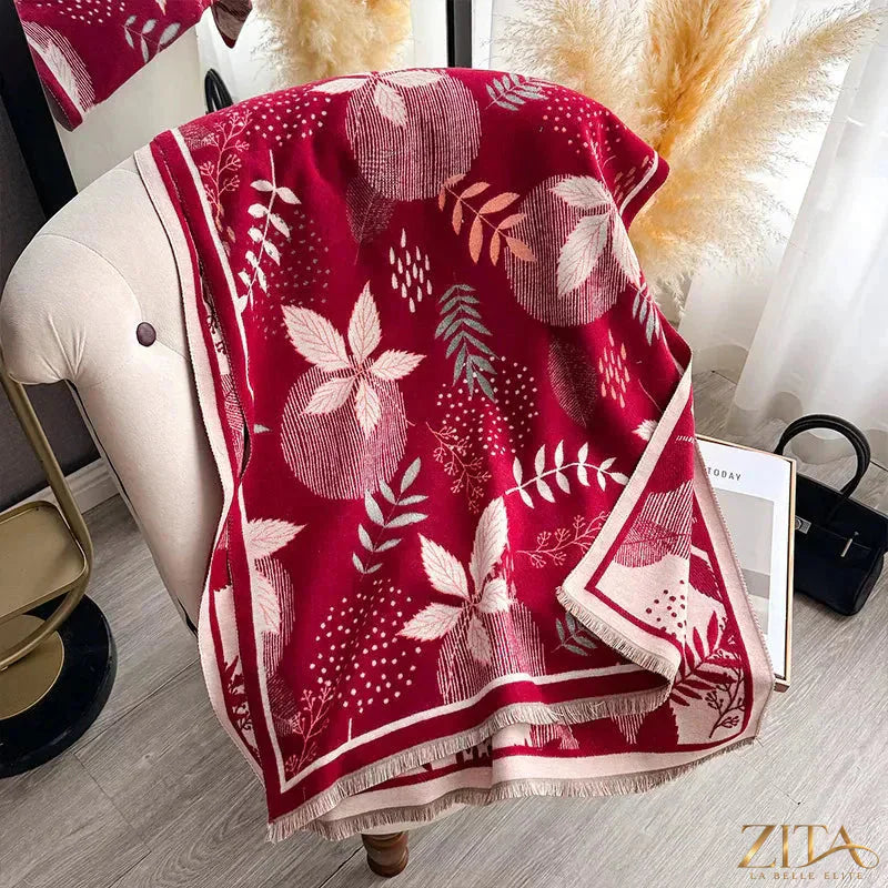 Printed raw hem scarf by Zita La Belle Elite featuring a lightweight fabric with a colorful, abstract pattern and raw edge detailing.