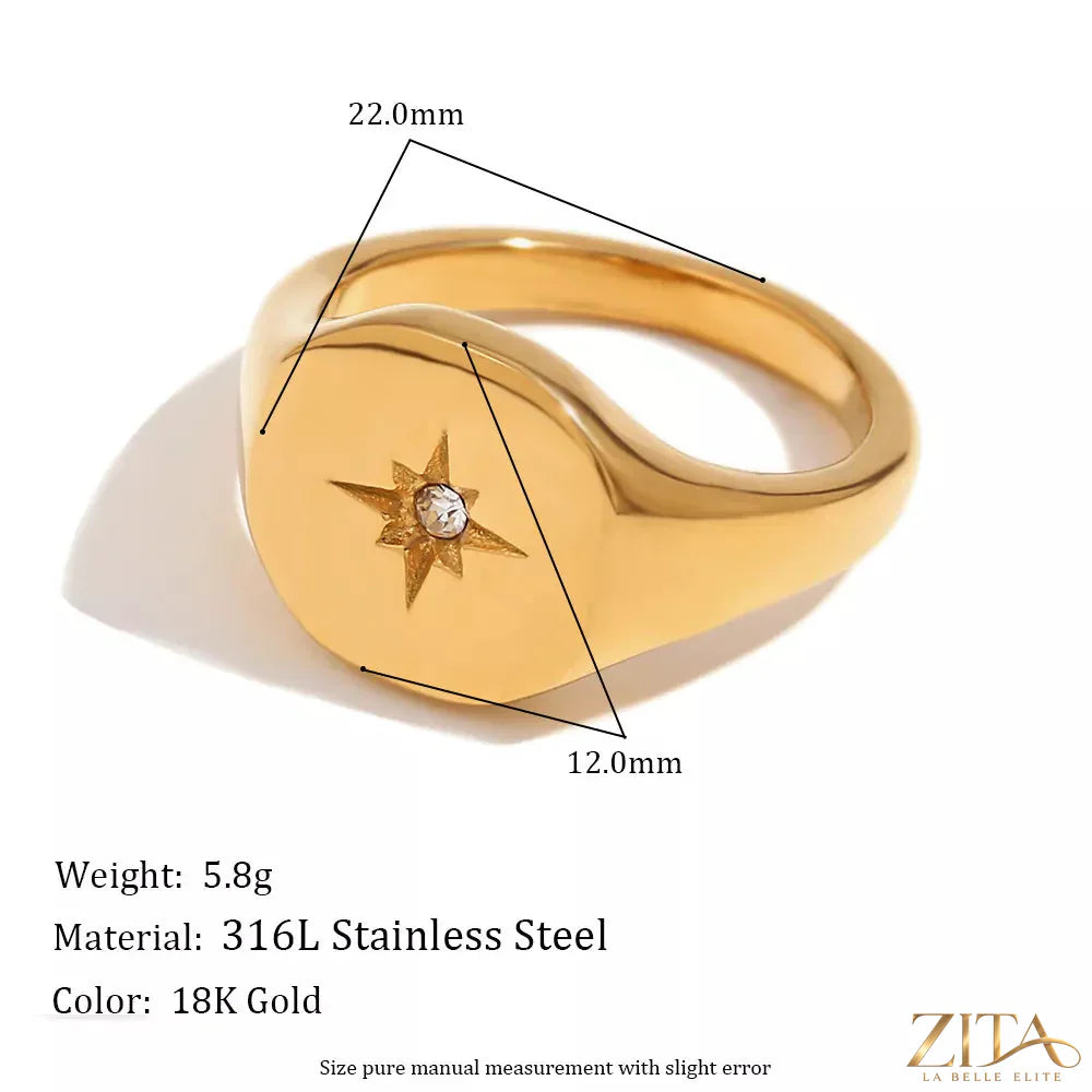 Minimalist North Star signet ring by Zita La Belle Elite, featuring a sleek design with a star motif on polished metal.