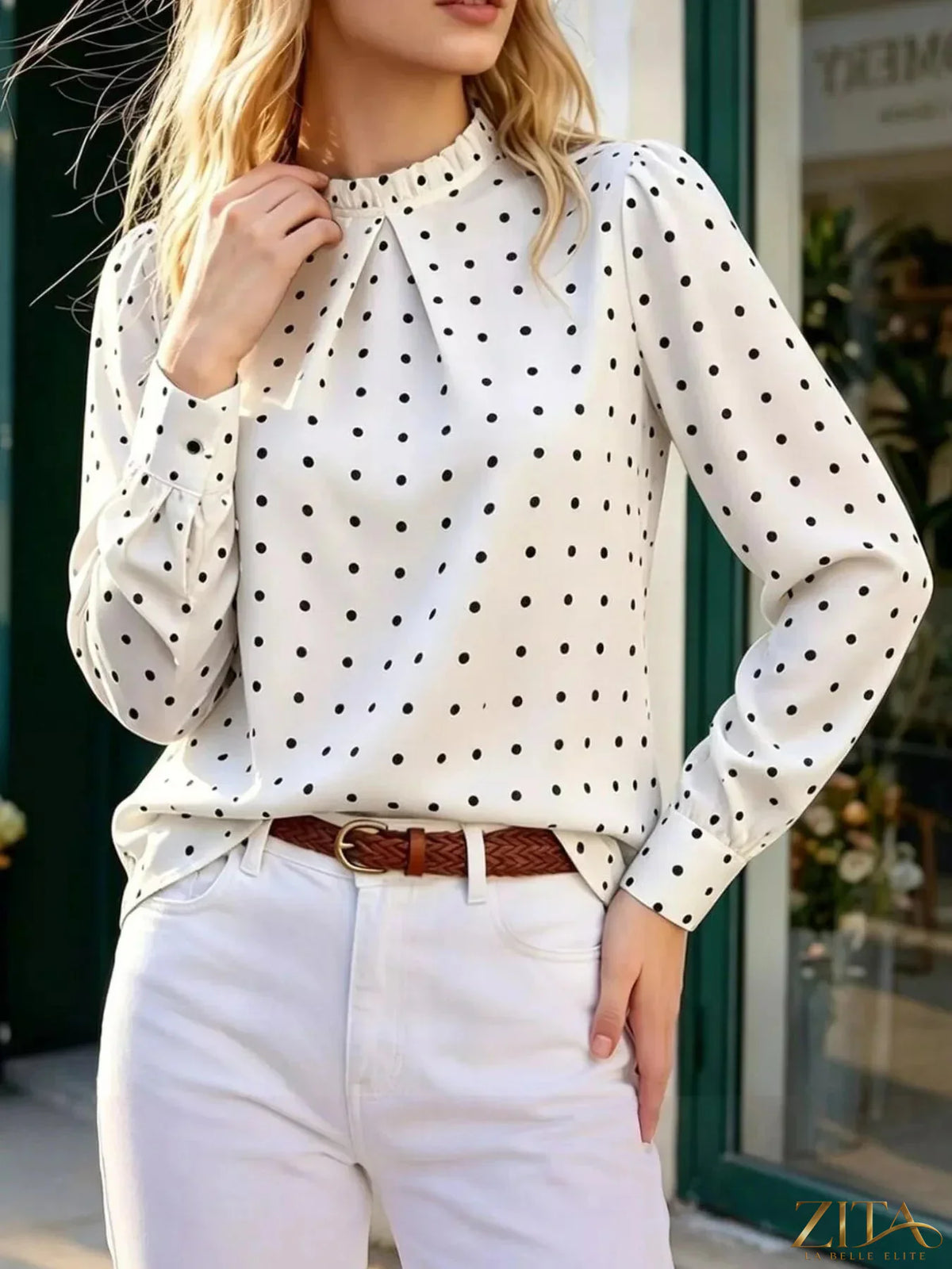Zita La Belle Elite polka dot print mock neck long sleeve blouse with elegant design and classic black and white dots.