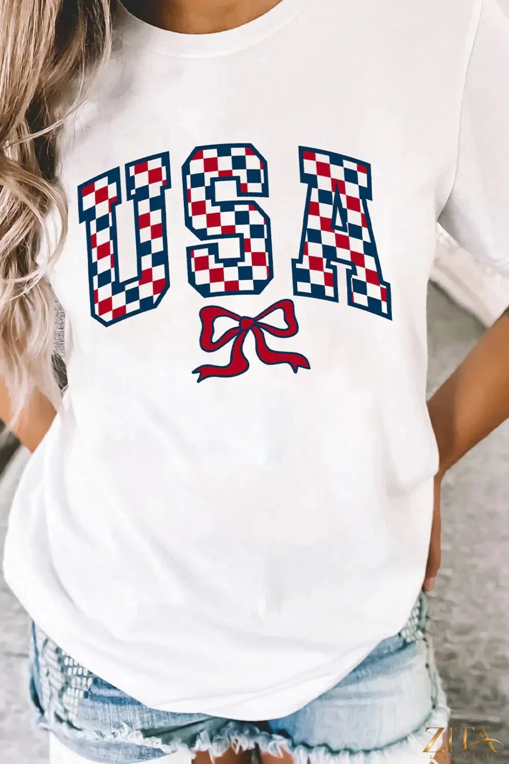 Checkered USA graphic round neck T-shirt by Trendsi featuring a bold checkered pattern and patriotic USA design.