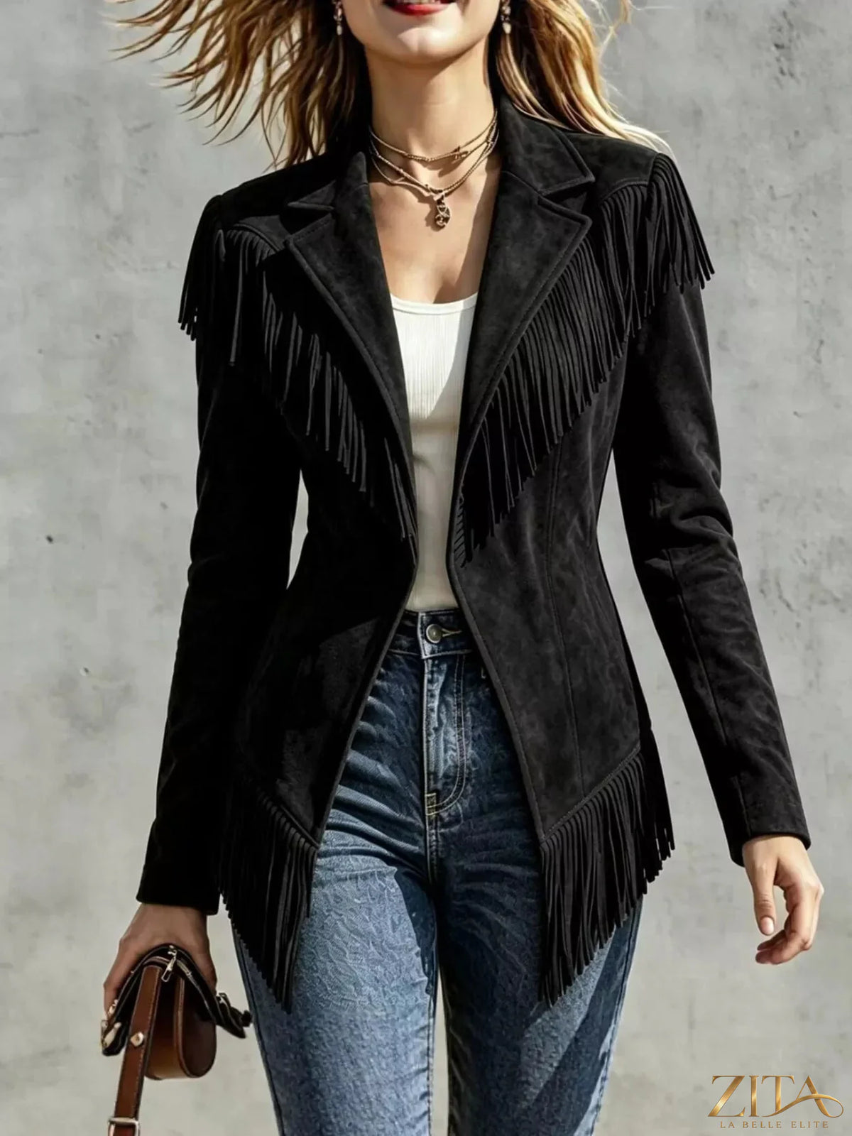 Western-inspired fringed open front jacket by Trendsi, featuring suede-like material and decorative fringe details.