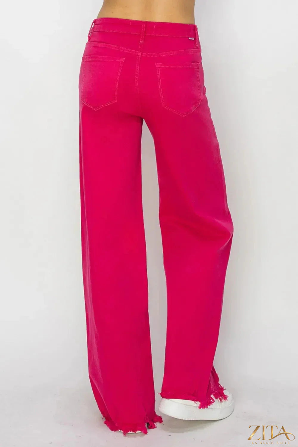 Zita La Belle Elite RISEN high-rise wide-leg jeans displayed on a hanger, showcasing their modern fit and stylish denim fabric.