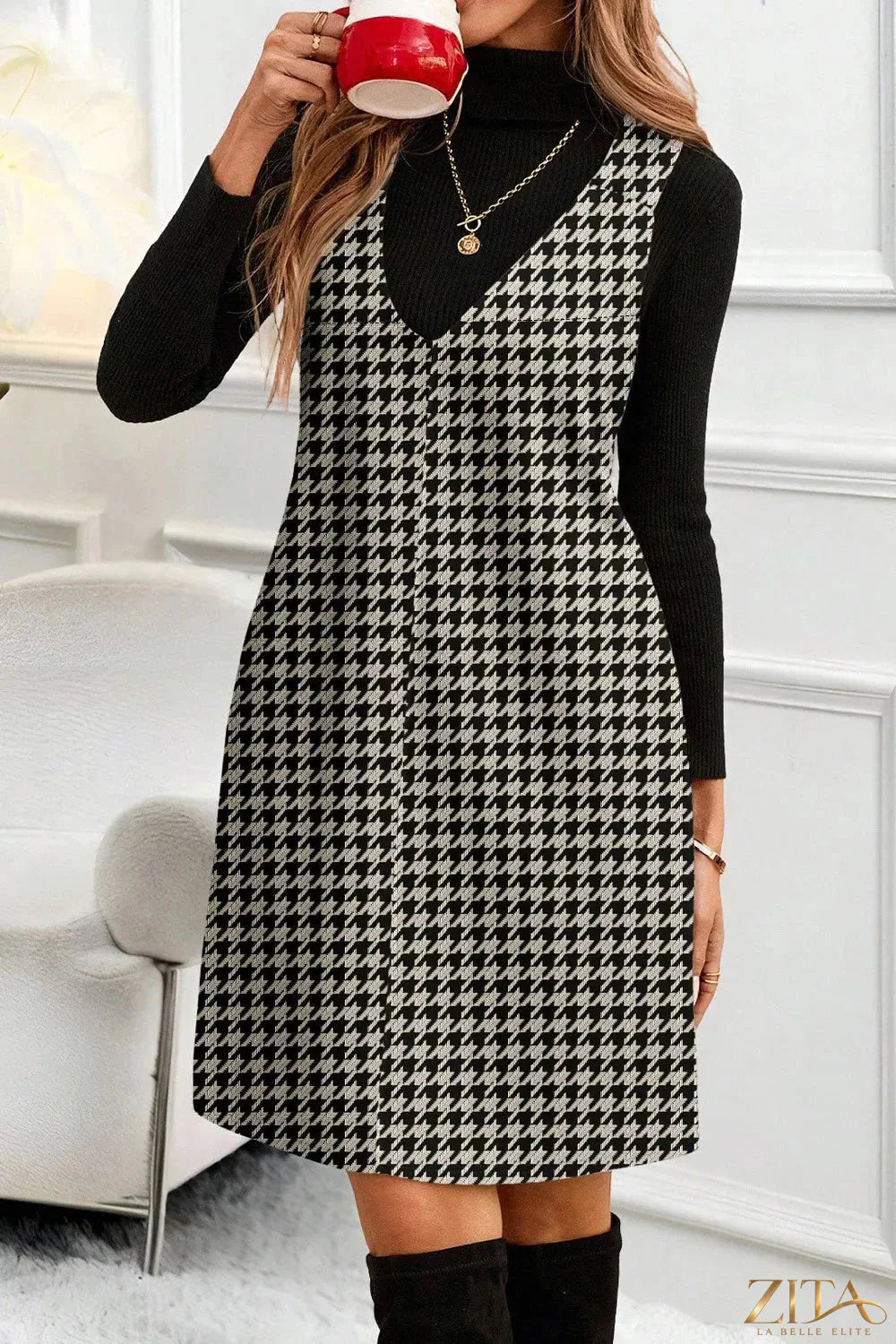 Houndstooth V-neck sleeveless mini dress by Trendsi featuring a fitted silhouette and stylish pattern.