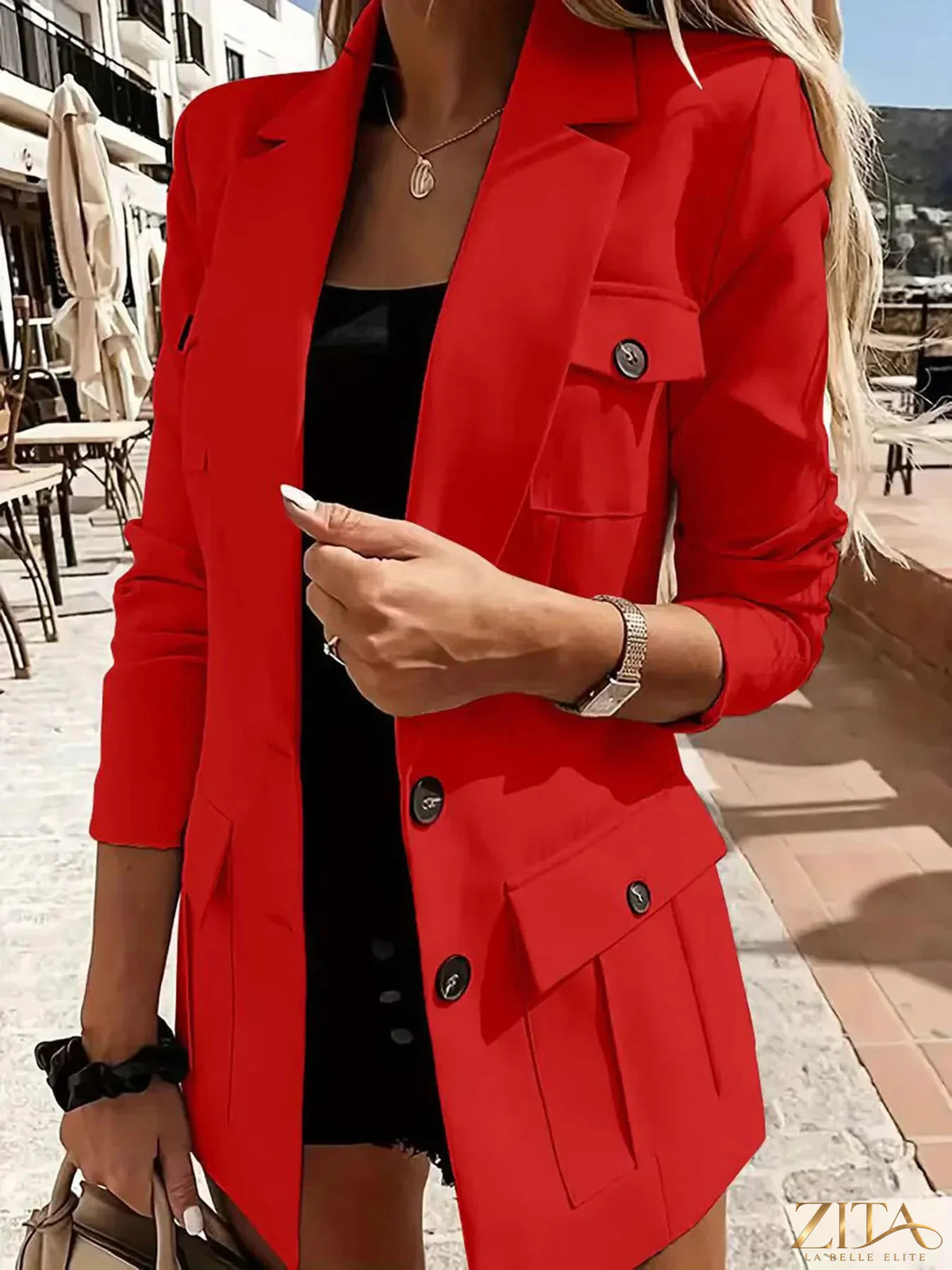 Zita La Belle Elite lapel collar long sleeve blazer with tailored fit and button closure, shown in dark fabric against a neutral background.