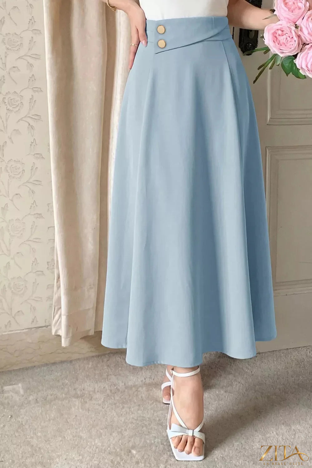 Zita La Belle Elite A-line midi skirt with front zipper, stylish and flowing skirt in neutral fabric, perfect for casual or formal wear.