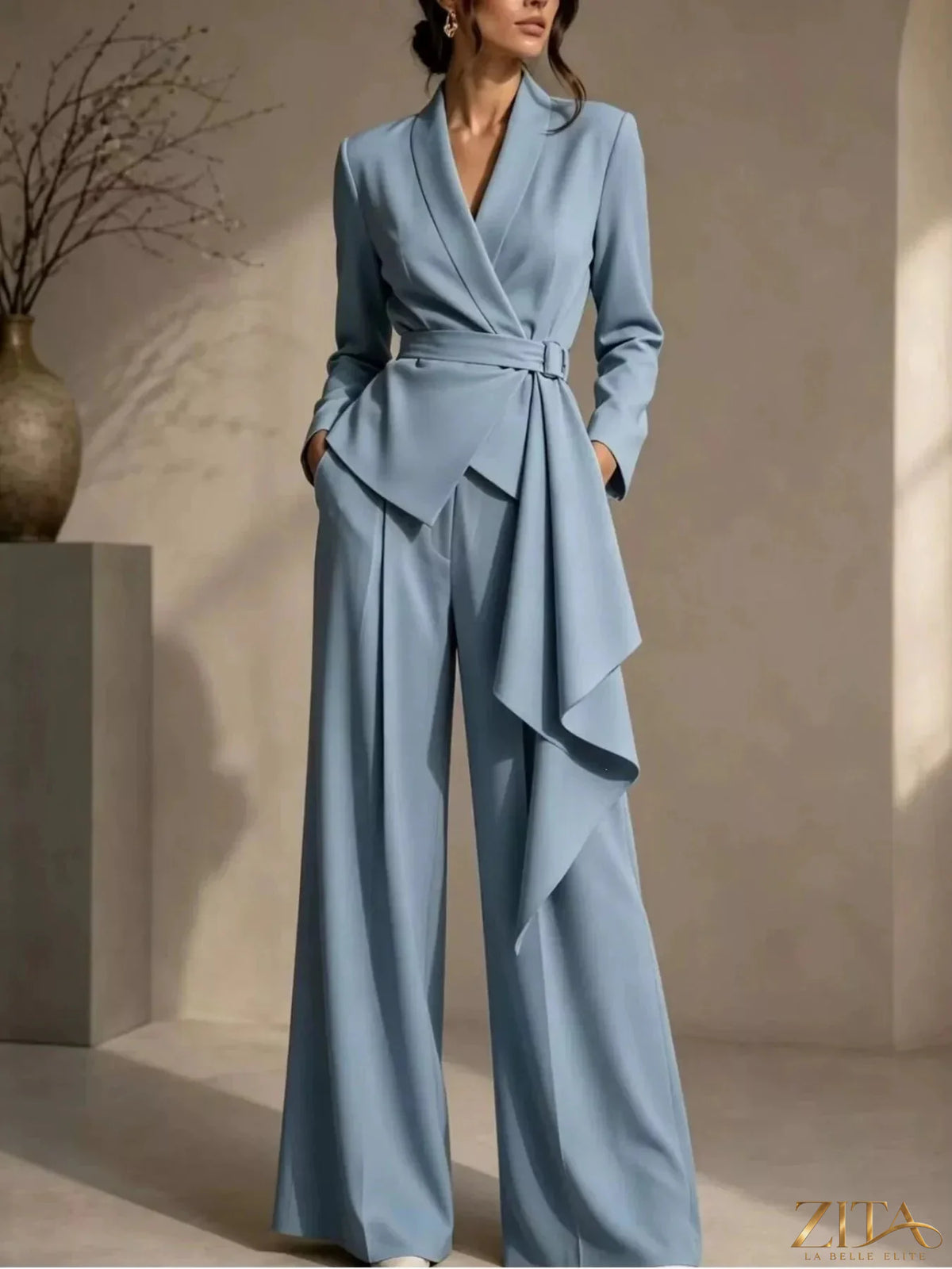 Plus size Zita La Belle Elite belted blazer and wide-leg pants set displayed on a model, featuring a structured blazer and flowy trousers.