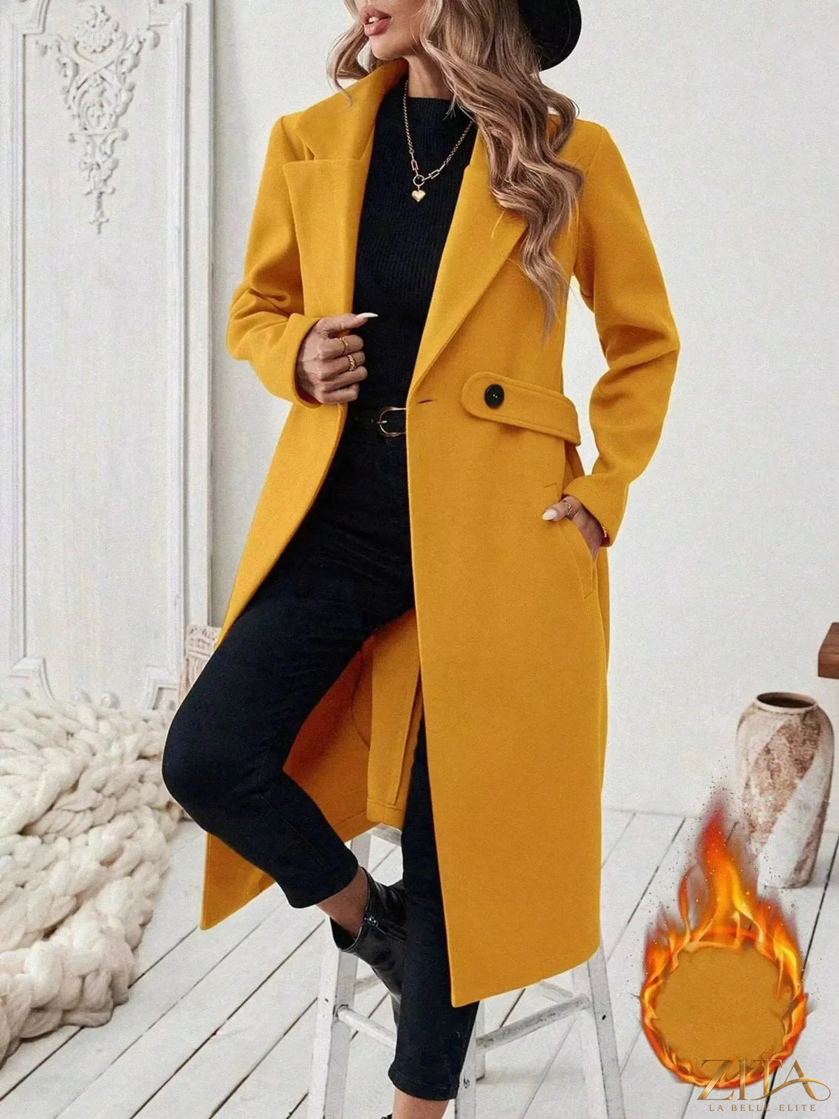 Longline coat with single-button closure from Zita La Belle Elite, shown in a sleek, stylish design on a model.