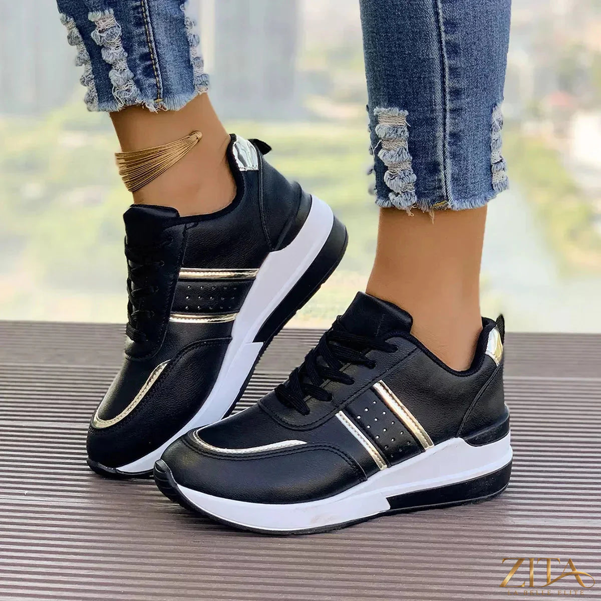 Zita La Belle Elite round toe lace-up sneakers in white with white rubber soles and stylish design, front view.