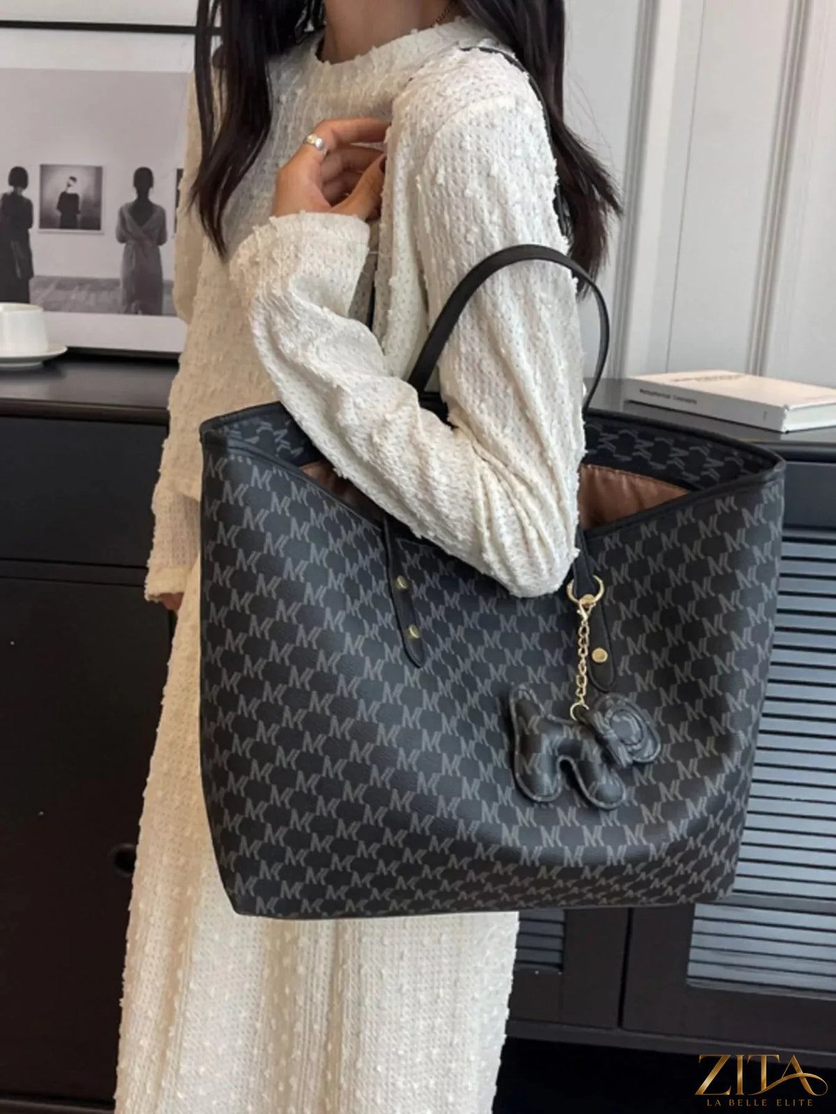 Trendsi PU leather shoulder bag with adjustable strap, stylish design, and spacious interior for everyday use