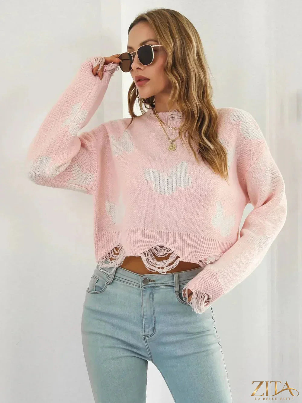 Distressed butterfly design cropped sweater by Zita La Belle Elite, featuring a casual fit and textured fabric.