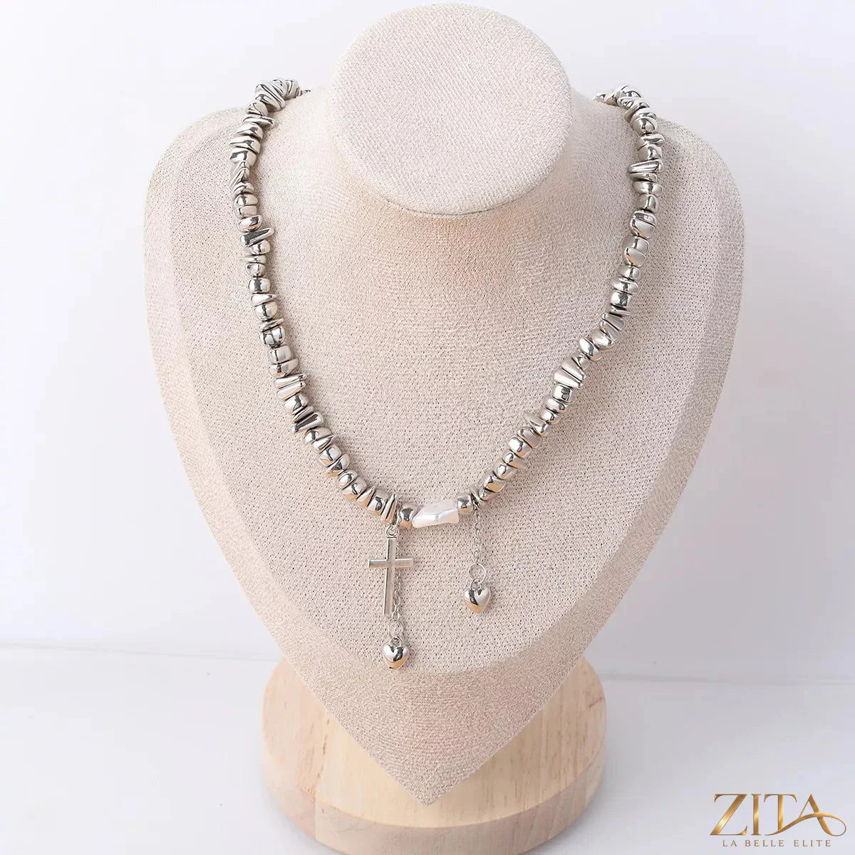 Zita La Belle Elite chunky chain cross pendant necklace with bold metal links and a prominent cross charm on a sleek chain.