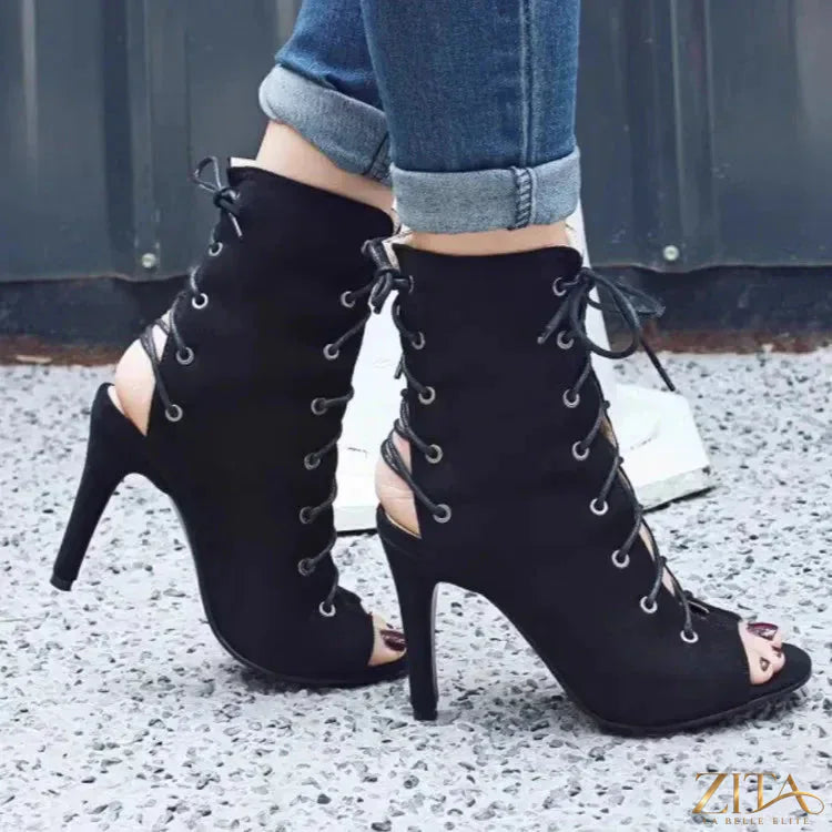 Zita La Belle Elite peep toe lace-up high heel boots with stiletto heels and stylish design, shown in black leather.