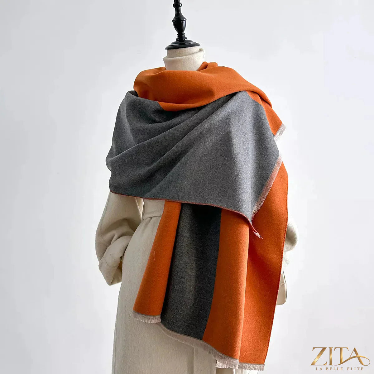 Two-tone raw hem scarf by Zita La Belle Elite featuring soft fabric and stylish fringe detail on each end.