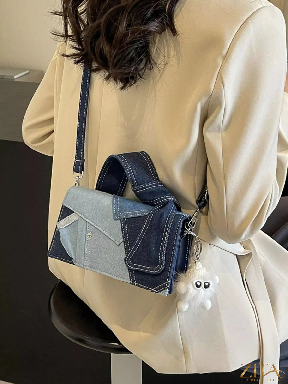 Zita La Belle Elite denim patchwork crossbody bag with adjustable strap and mixed fabric design for casual style.
