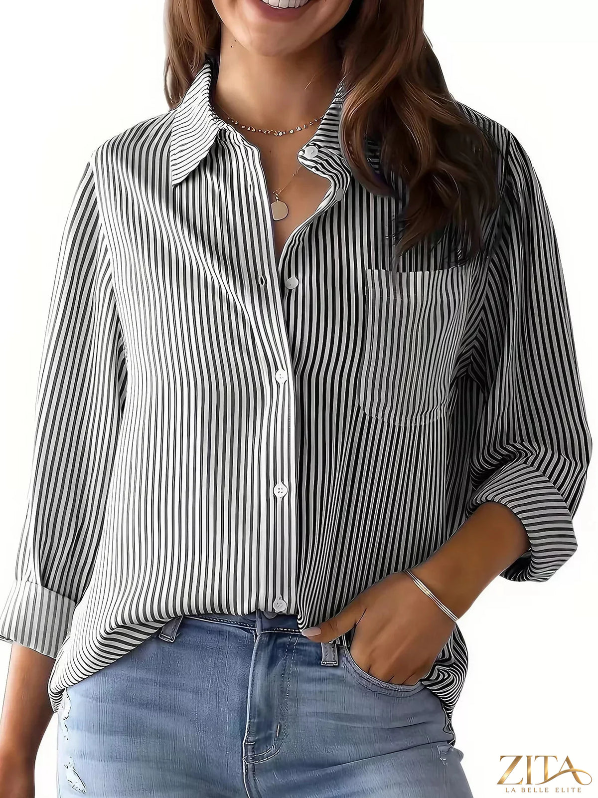 Zita La Belle Elite classic striped button-down shirt with blue and white vertical stripes, long sleeves, and collar.