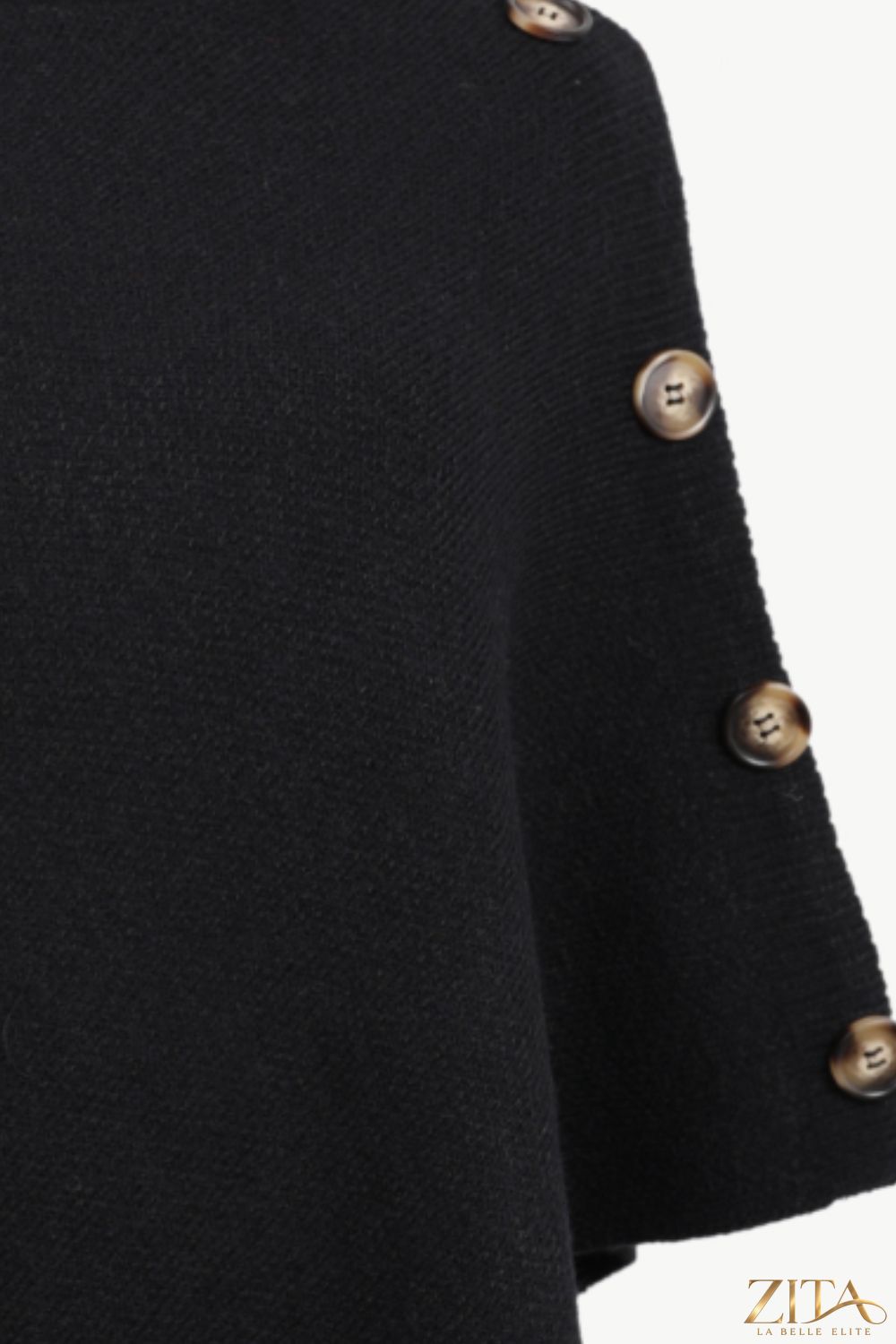 Zita La Belle Elite turtleneck buttoned poncho in cozy knit fabric, featuring a high collar and button accents.