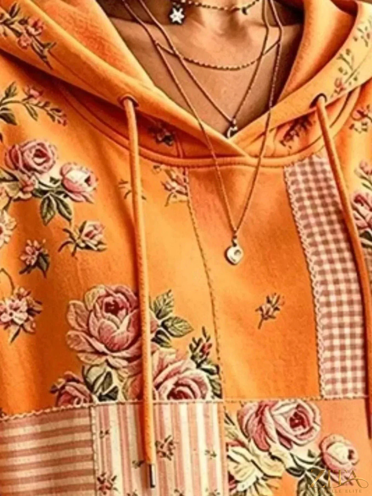 Full size floral dropped shoulder hoodie with drawstring from Zita La Belle Elite, plus size, featuring a relaxed fit and vibrant floral design.