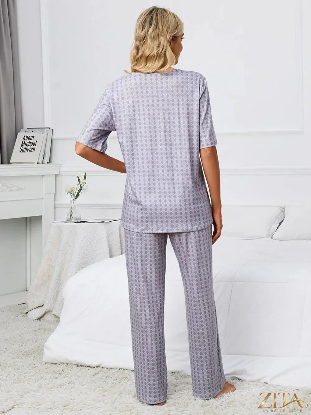 Printed V-neck top and pants lounge set by Zita La Belle Elite, featuring a comfortable, stylish two-piece design with floral print.