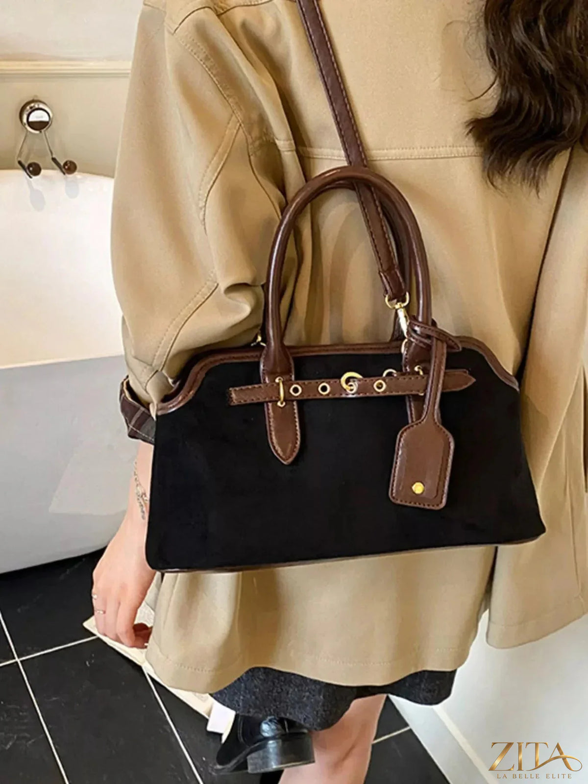 Vintage Zita La Belle Elite handbag with buckle detail, showcasing a classic leather design and elegant craftsmanship.