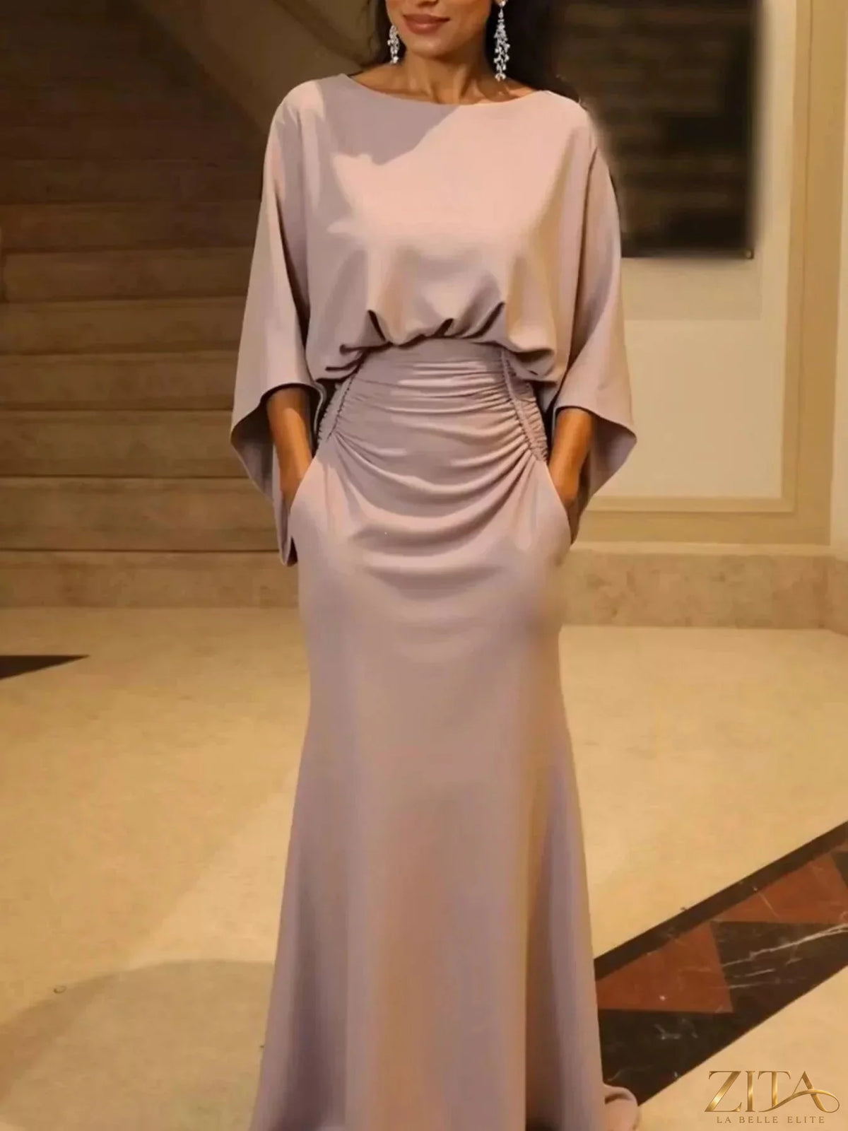 Zita La Belle Elite batwing sleeve ruched maxi dress in flowing fabric with a fitted waist and elegant design.