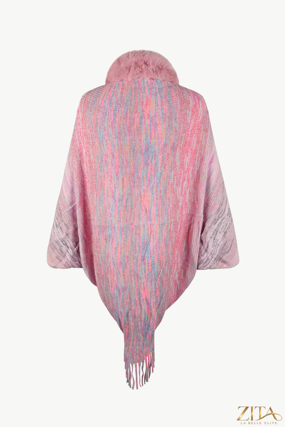 Open front fringe hem poncho by Trendsi, featuring a stylish draped design with fringe details in soft, cozy fabric.