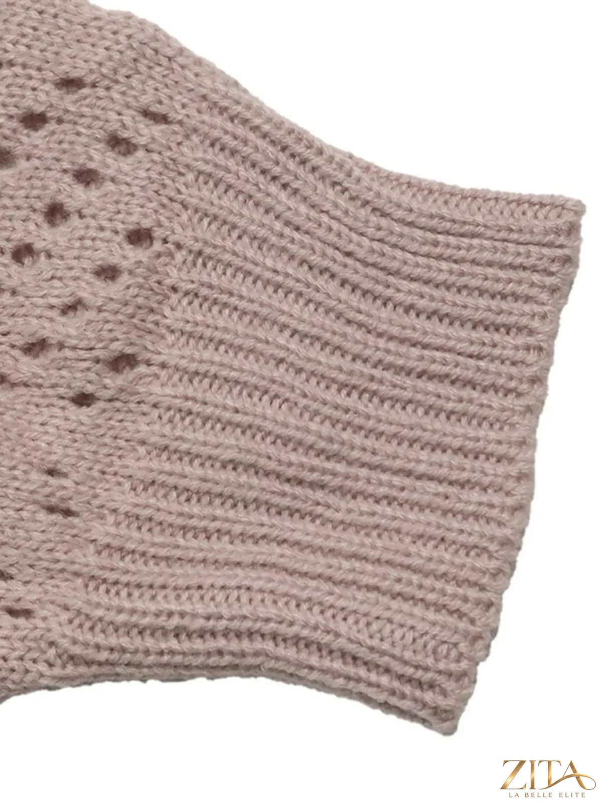 Openwork Zita La Belle Elite mock neck sweater featuring intricate open-knit design and fitted style, shown on a model.