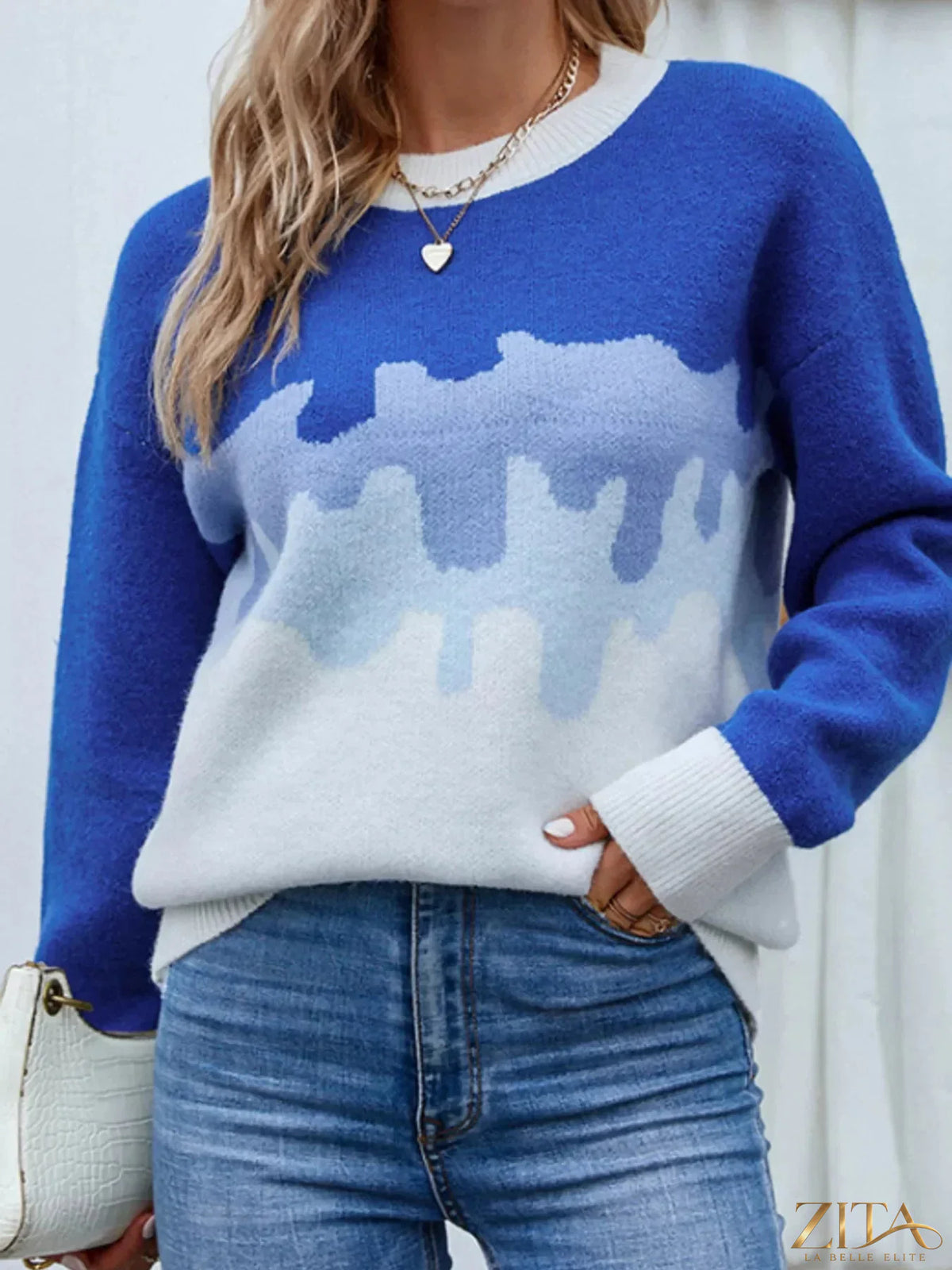 Contrast round neck sweater by Trendsi, showing a close-up of the soft knit fabric and contrasting color details.