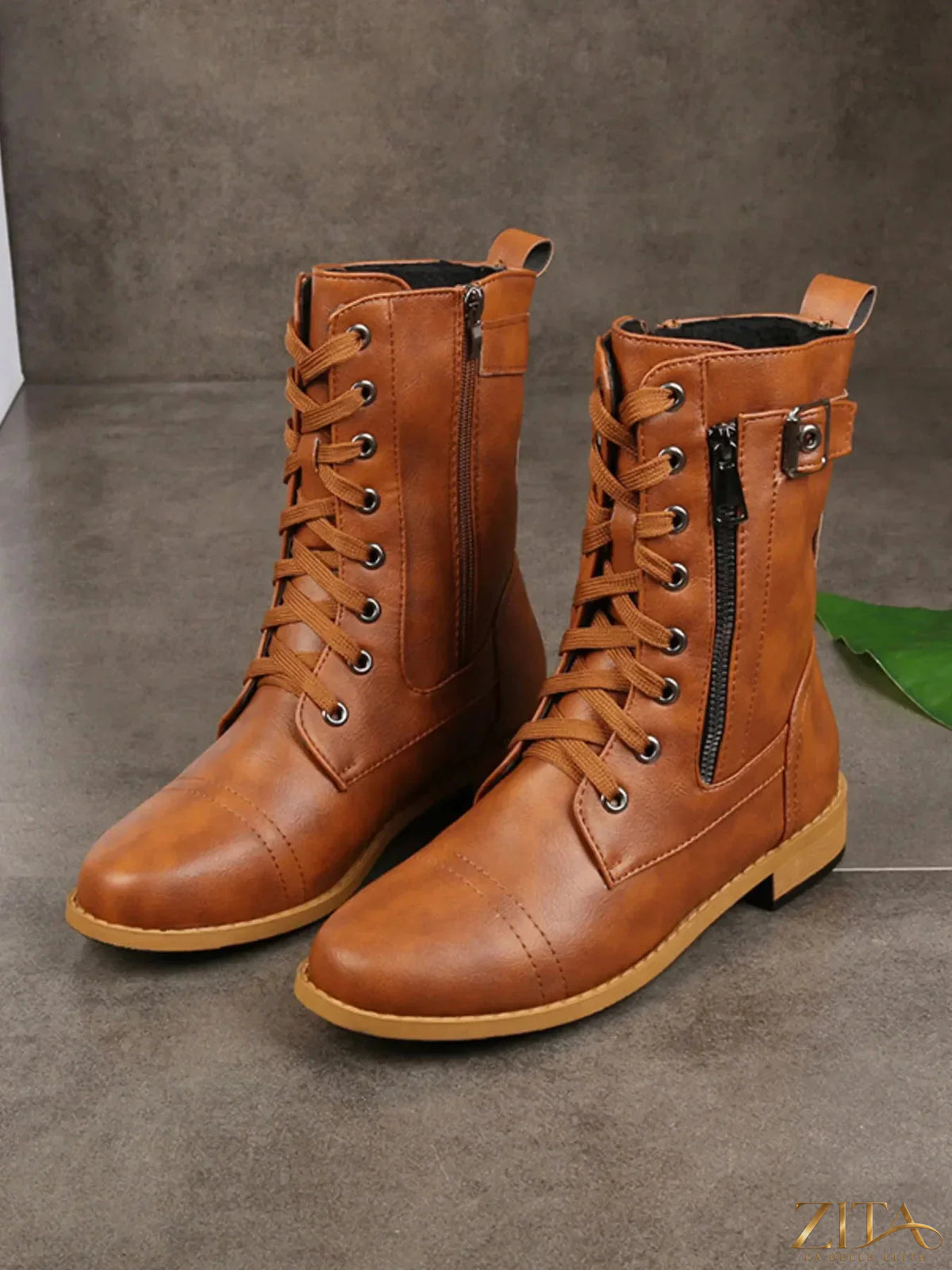 Zita La Belle Elite lace-up boots with buckle detail, featuring a stylish design and ankle-high silhouette.
