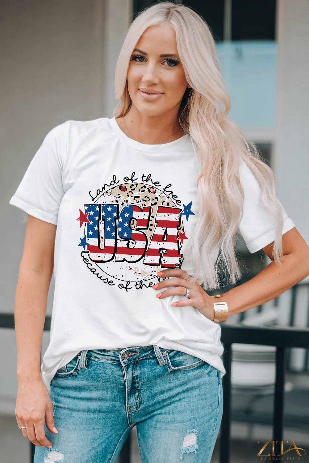 USA graphic round neck T-shirt by Trendsi featuring a bold patriotic USA flag design on soft cotton fabric.