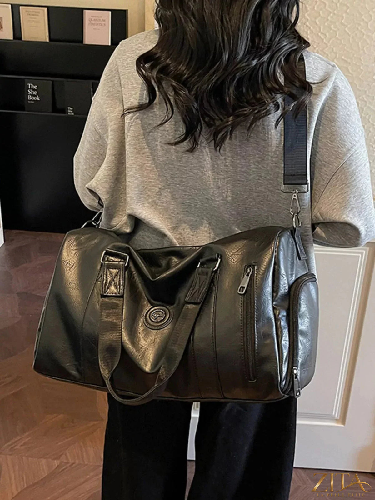 Trendsi PU leather duffel bag with sturdy handles and spacious interior, ideal for travel or gym use.
