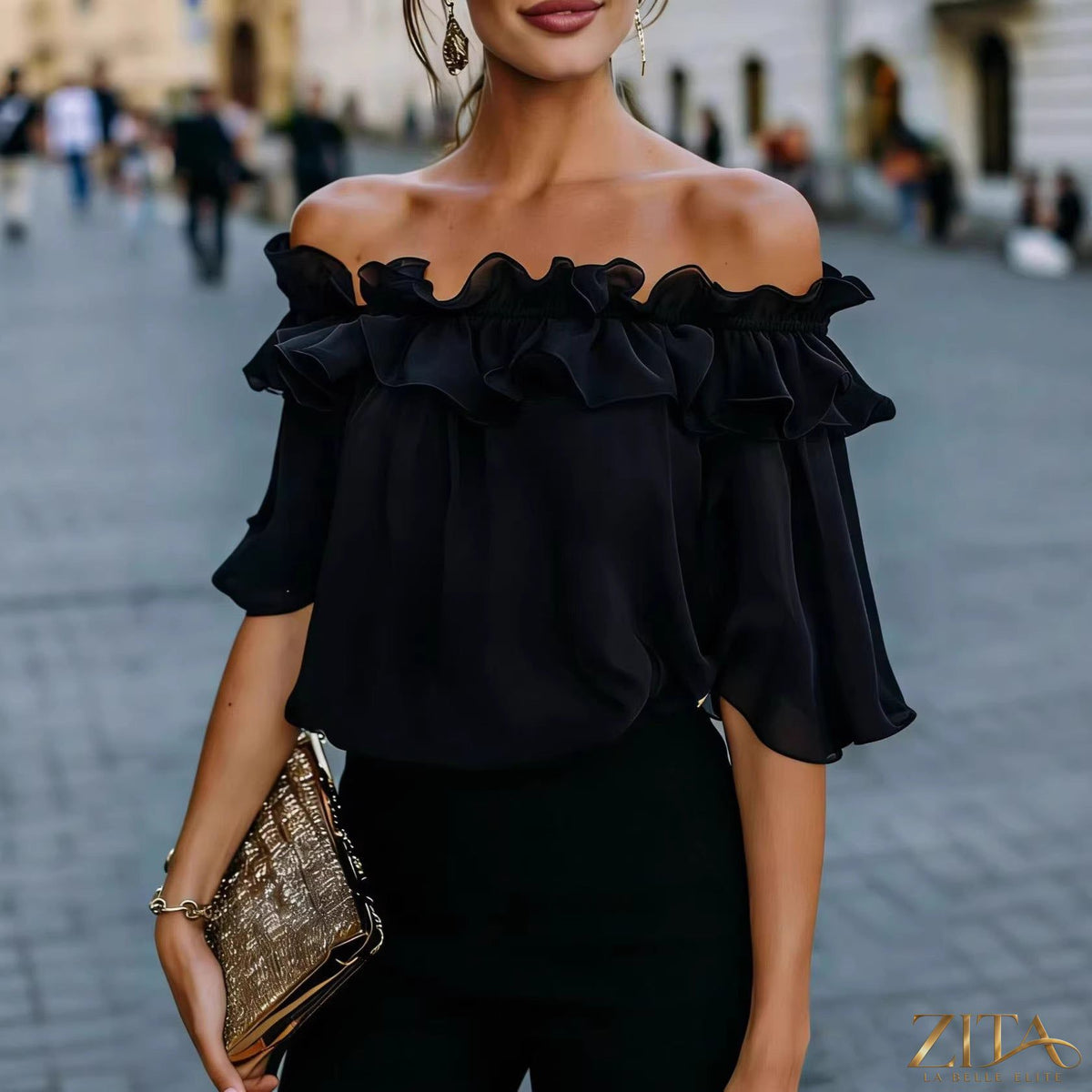 Women's loose-fit minimalist short-sleeve casual shirt by Zita La Belle Elite, shown in a relaxed fit with a simple, clean design.