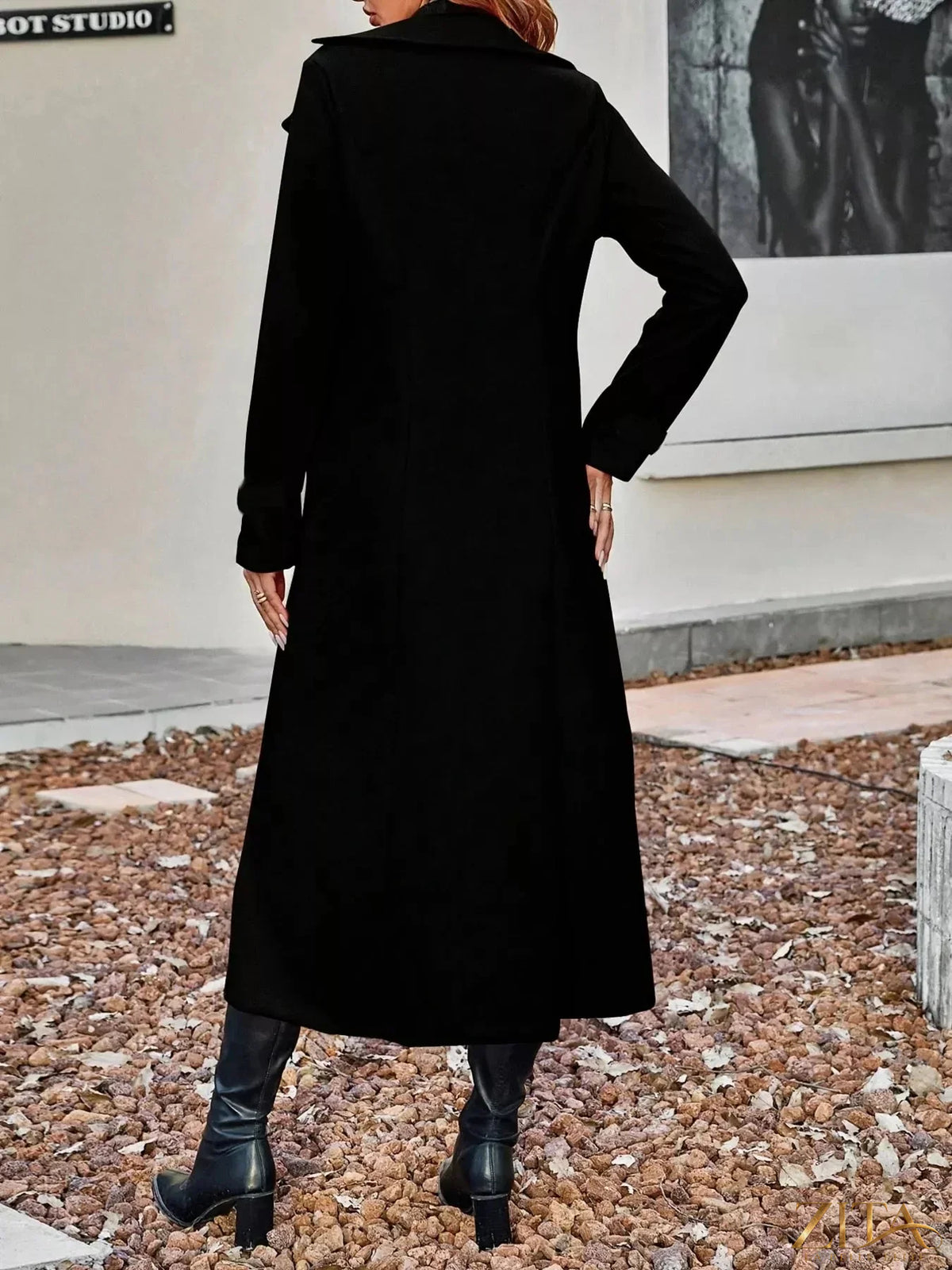 Zita La Belle Elite double-breasted longline coat in neutral fabric, featuring a tailored fit and classic lapel collar.