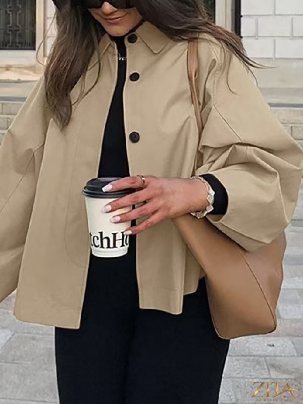 Women's French-style loose mid-length trench coat by Zita La Belle Elite, featuring classic design and workwear chic fashion.