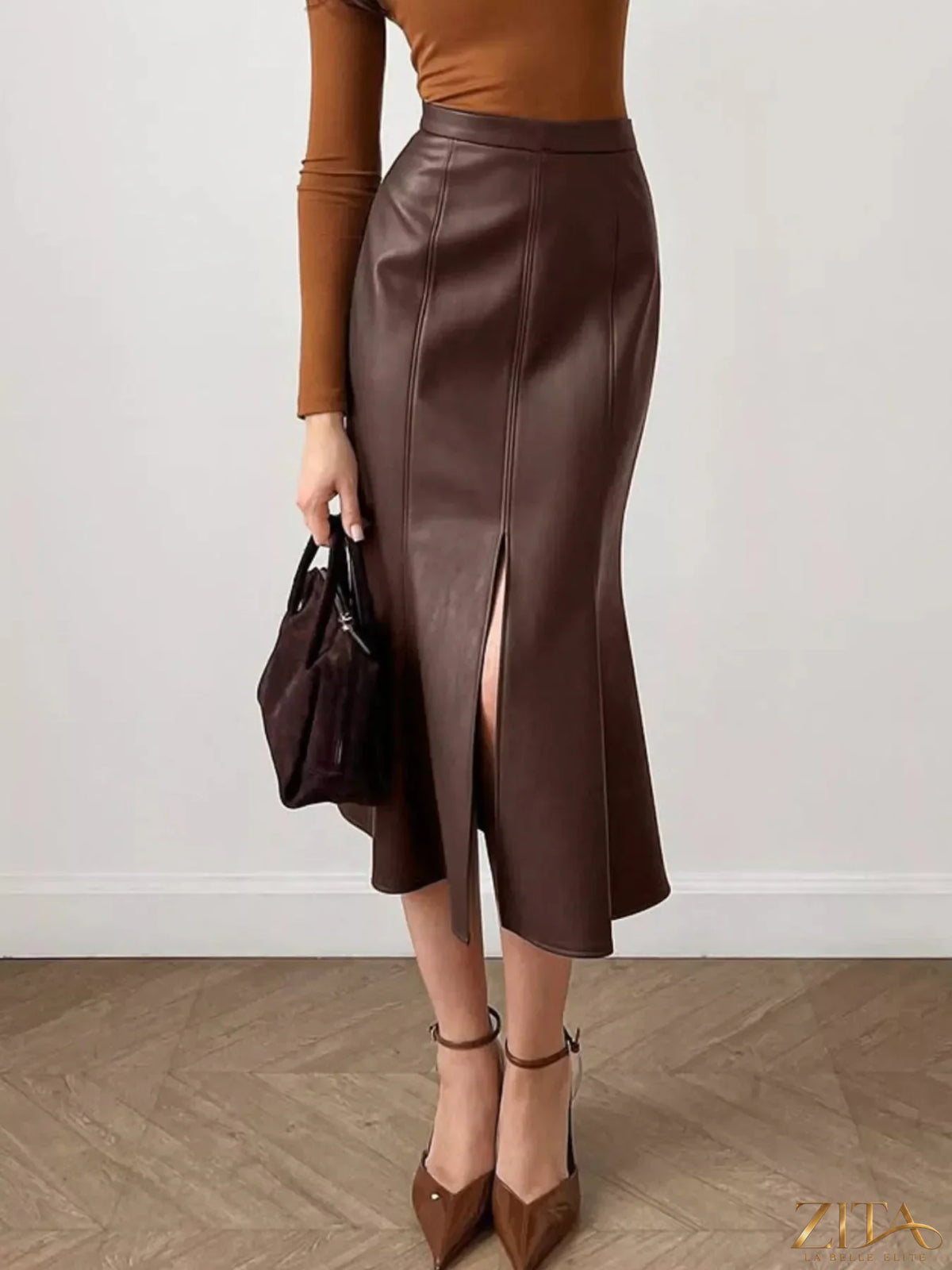 Zita La Belle Elite slit mermaid midi skirt in flowing fabric, showcasing a fitted silhouette with a stylish slit detail.