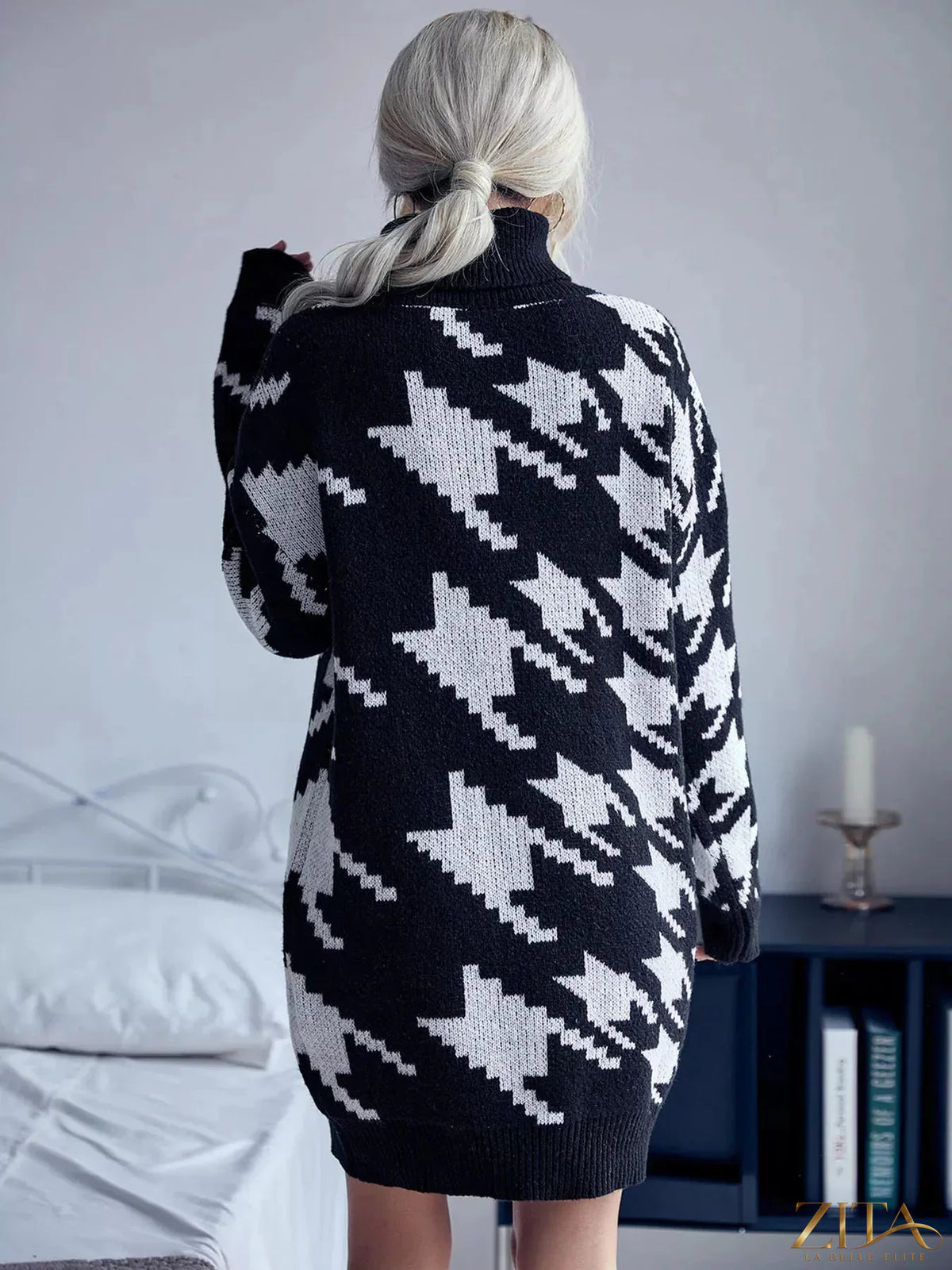 Houndstooth pattern turtleneck sweater dress by Trendsi, featuring a cozy knit fabric and fitted silhouette.