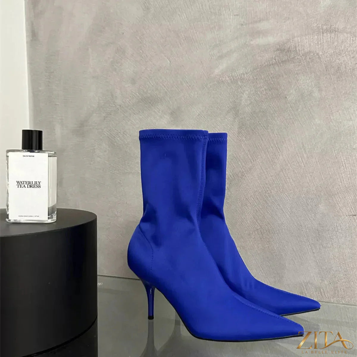 Zita La Belle Elite point toe mid heel boots in black leather with sleek design and stylish silhouette.