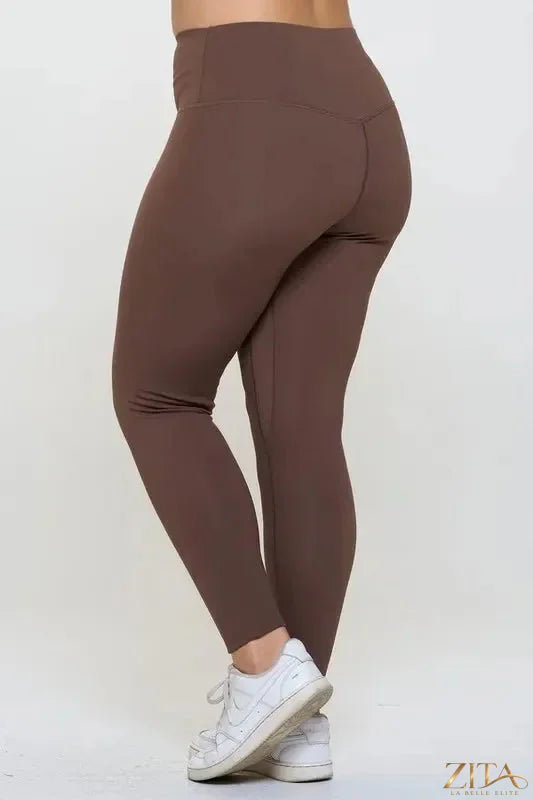 Black Yelete full size fleece-lined high waisted leggings with a snug fit, ideal for cold weather and comfortable wear.
