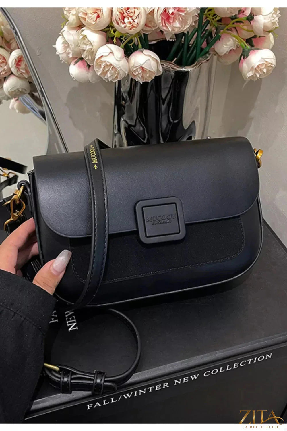 Zita La Belle Elite flap closure shoulder bag with sleek design and adjustable strap, made from high-quality material.