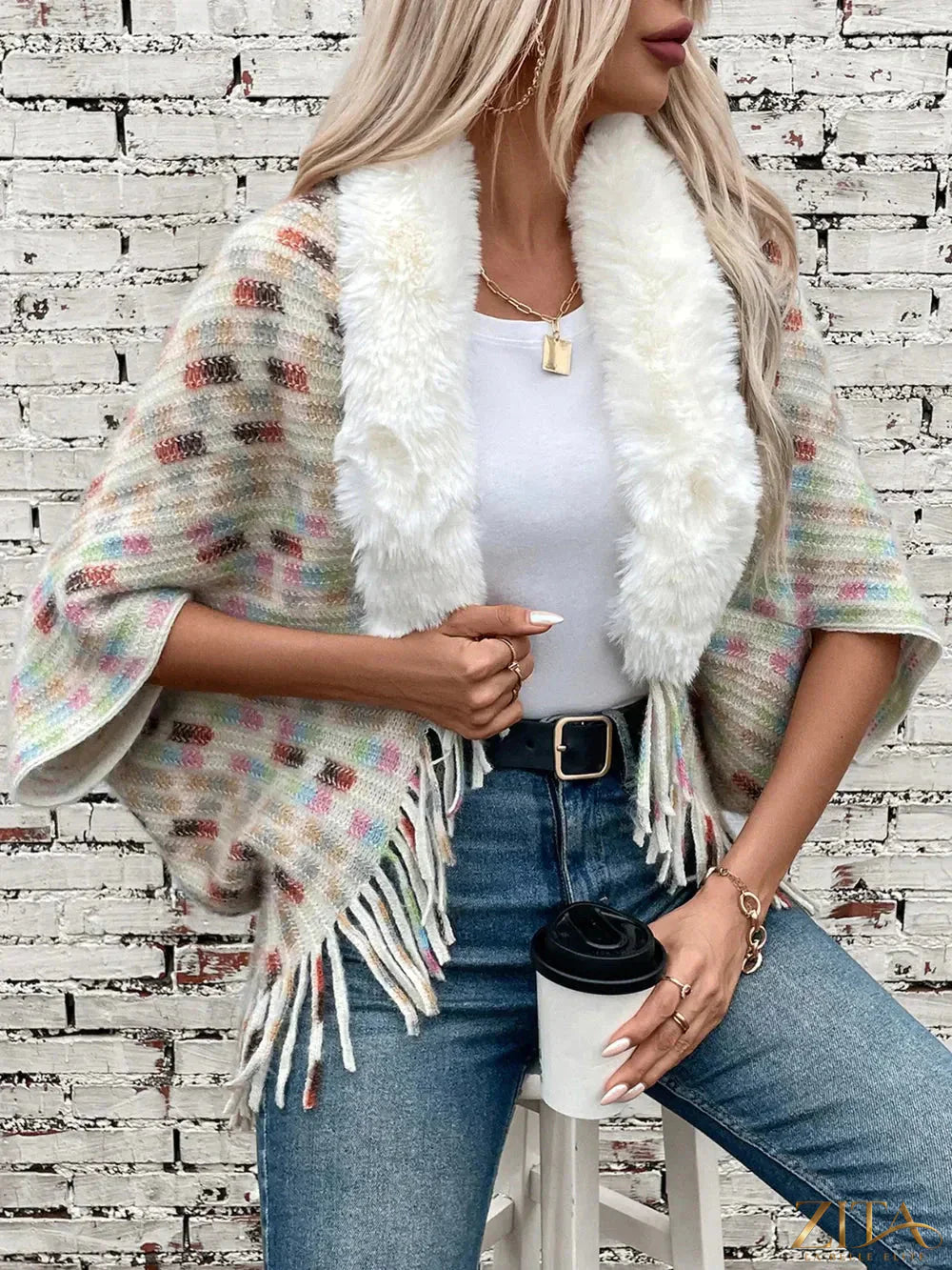 Fuzzy open front fringe poncho in neutral tones, stylish and cozy Trendsi fashion piece with decorative fringe detailing.