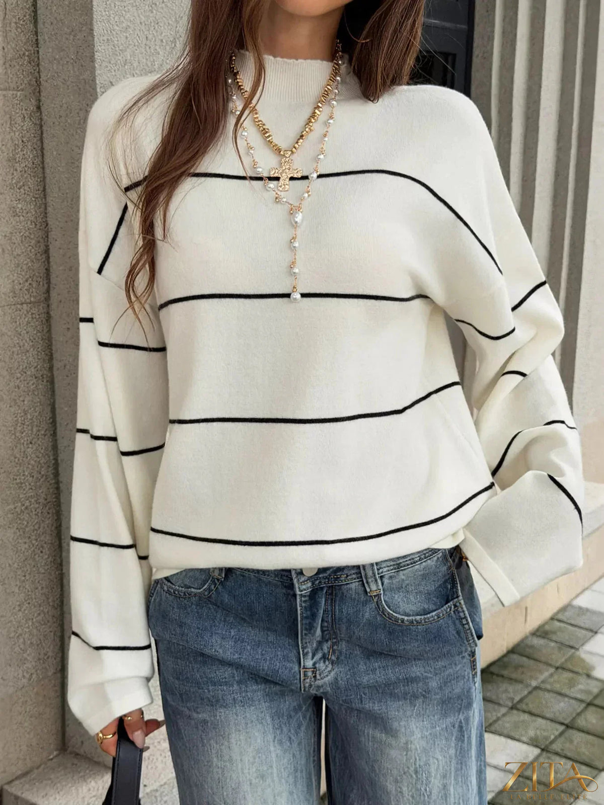 Zita La Belle Elite striped mock neck sweater featuring horizontal black and white stripes and a cozy fit.