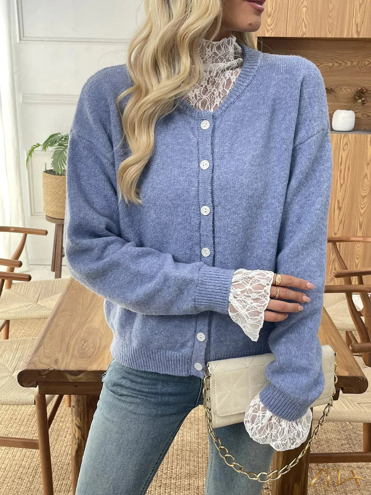 Zita La Belle Elite button-down cardigan with delicate lace trim, soft knit fabric, and classic style, shown in a close-up view.
