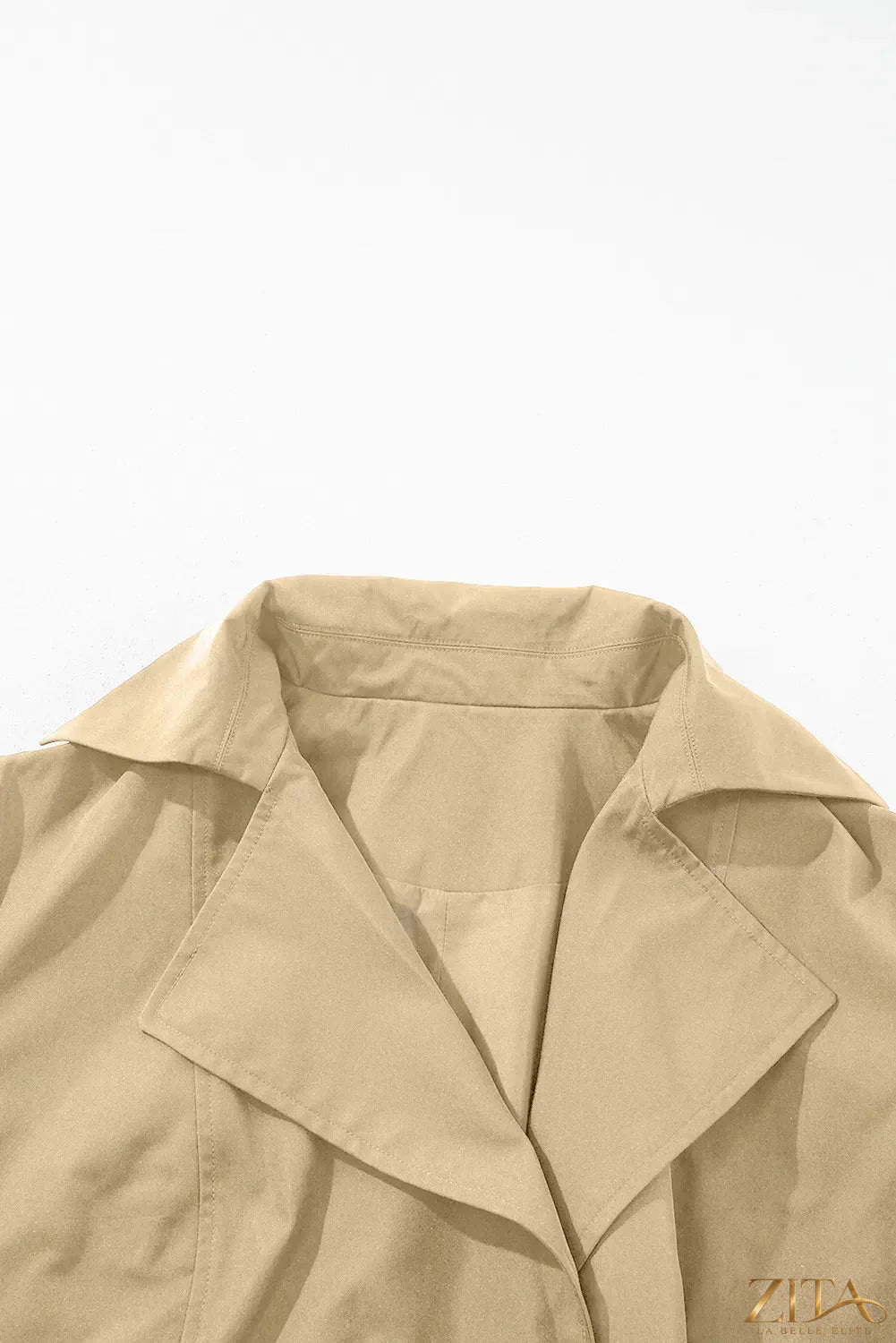 Zita La Belle Elite long trench coat with collar, waist tie, buttons, and long sleeves, stylish and elegant outerwear.