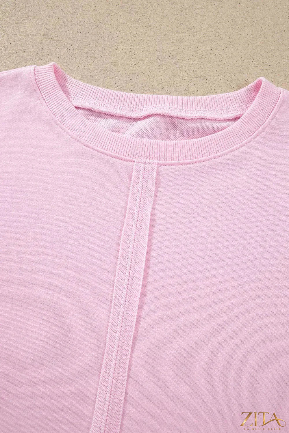 Zita La Belle Elite solid color raw seam lace detail loose casual sweatshirt, showing relaxed fit and stylish design.